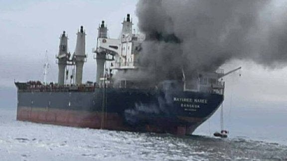 ship burning in the Strait of Hormuz after attack