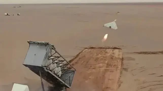 An Iranian Shahed drone launches from a multi-pack rack (IRGC file image)