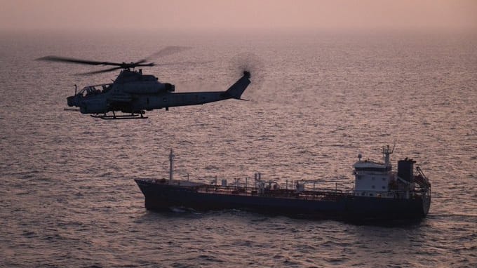US  helicopter monitoring commercial shipping
