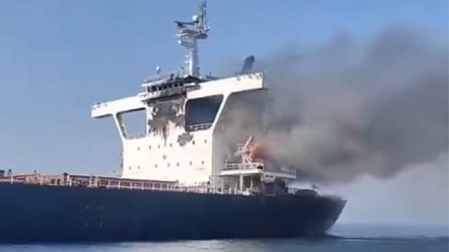 bulker on fire after being struck by projectiles