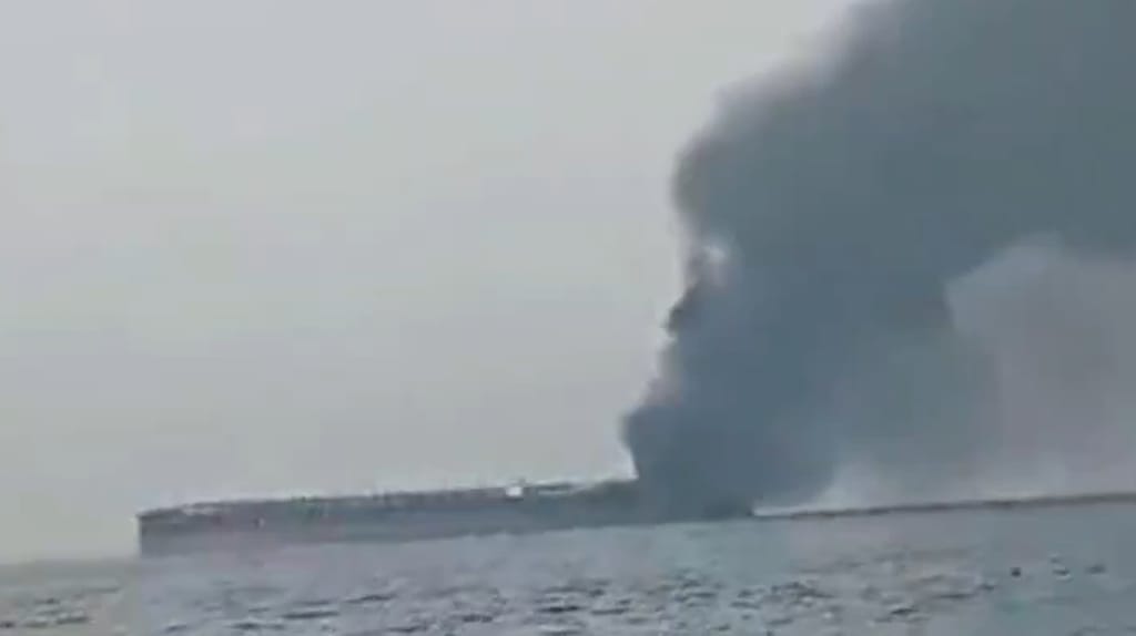 Iranian state media released a video of a tanker in ballast, smoke pouring from its stern (Iranian state media)