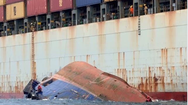 capsized tugboat