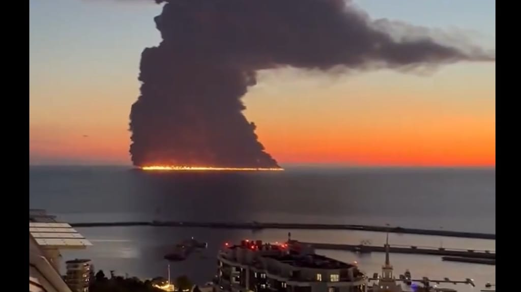 Spreading, burning pool of oil from a tanker off the coast of Sochi, Oct. 6 (Russian social media)