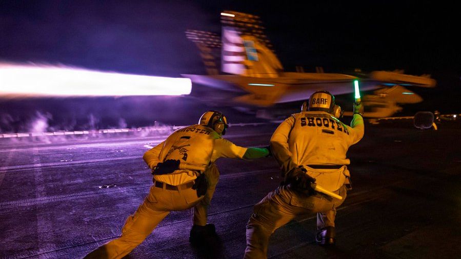An F/A-18 launches from the deck of USS George H.W. Bush, September 2026 (USN)