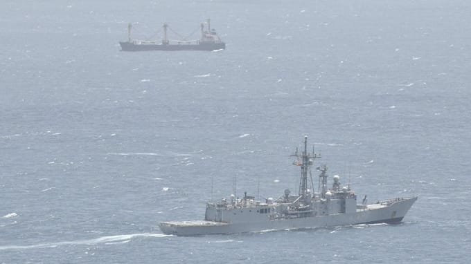 warship monitoring hijacked vessel
