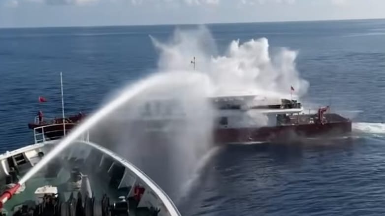 Taiwan Coast Guard firing water cannon on Chinese fishing vessel