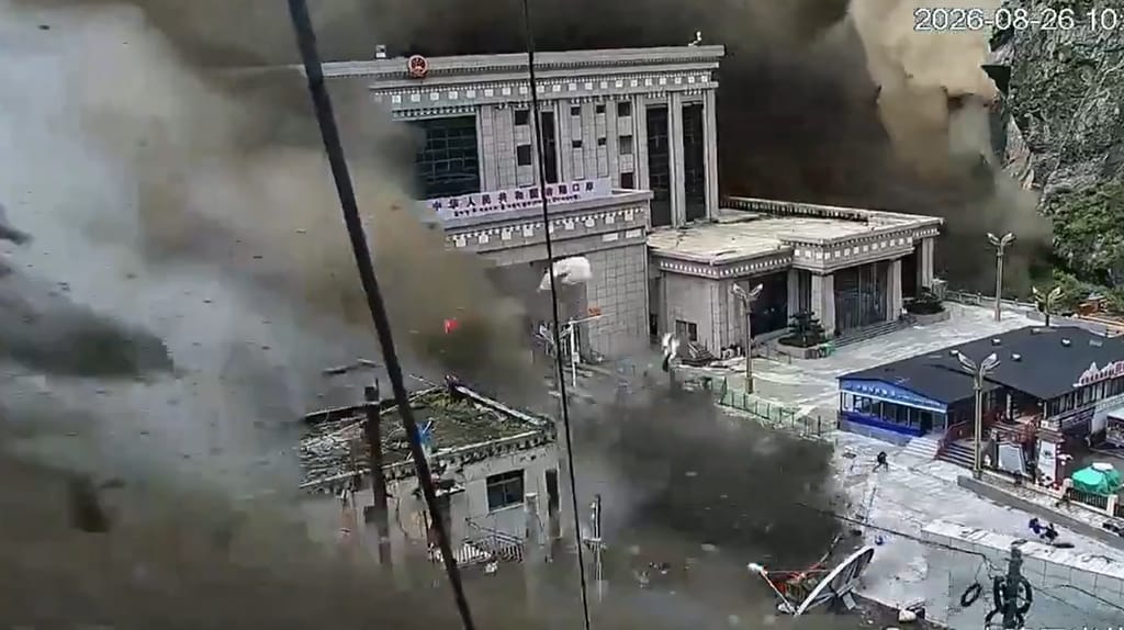 Water, mud and flying rocks engulf the Gyirong border post (Chinese social media)