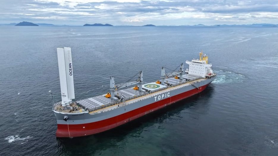bulker with wind propulsion and solar panels for electricity