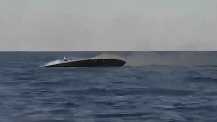 The damaged Russian drone boat lists to port and begins to sink by the stern (Ukrainian Navy)