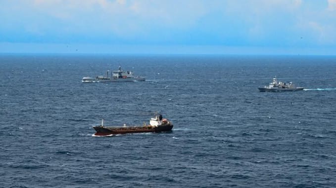 New Zealand warships monitoring vessel