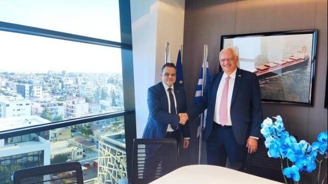l-r Apostolos Poulovassilis, Director (Greece) at OTG shakes hands with Dr Loukas Barmparis,  President of Safe Bulkers Inc.