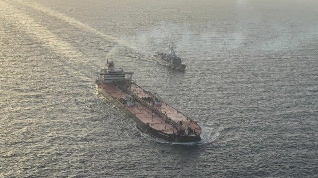 warship escorting tanker