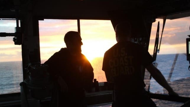 Seafarers on bridge
