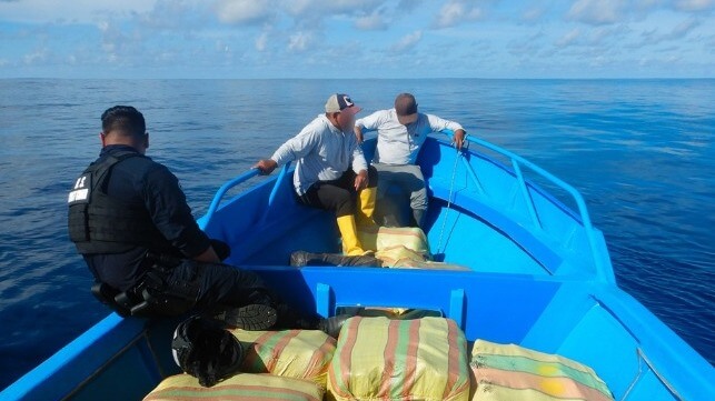 A boarding team from the cutter USCGC Bear detains two suspects in the Eastern Pacific (USCG)