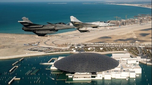 A visiting French Air Force Dassault Rafale (left) over the Louvre Abu Dhabi, 2021; the UAE has ordered 80 of the type, and has strategic options for defending its ports and shipping (French Air Force file image)
