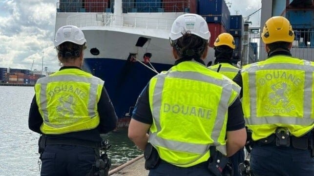 Dutch Customs officers boarding containership