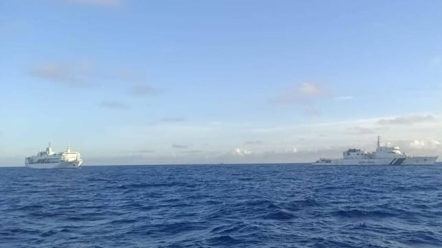 stranded passenger ship towed by Indian Coast Guard