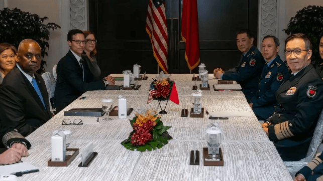 Secretary of Defense Lloyd Austin meets with PRC defense minister Adm. Dong Jun in Singapore, May 31, 2024 (Pentagon)