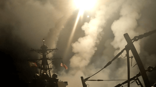 A U.S. Navy destroyer launches missiles at Houthi targets, a campaign described in war plans leaked to Jeffrey Goldberg of The Atlantic (USN)