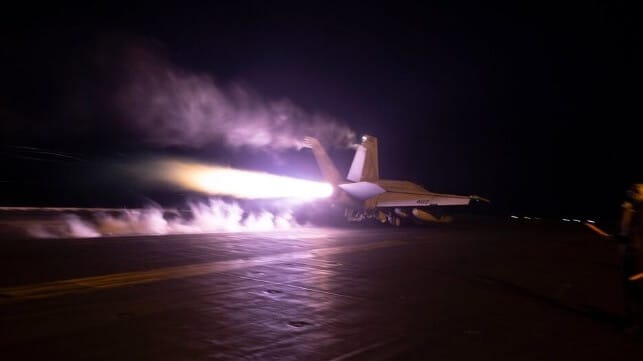 An F/A-18 fighter launches from the deck of USS Dwight D. Eisenhower en route to a Houthi target, Feb. 2024 (USN)