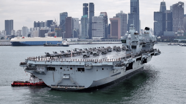 HMS Prince of Wales docks at Singapore’s new Marina Bay Cruise Centre (RAF)