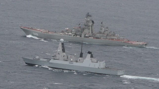 Sister ship Pyotr Velikiy (background) with the much smaller Royal Navy destroyer HMS Dragon (foreground) (Royal Navy file image)