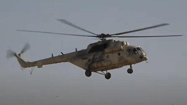 Houthi rebels with a boat