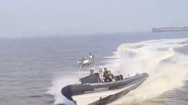 The Indian Navy response boat approaching the ferry at speed (Indian social media)