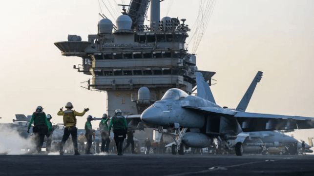 An F/A-18 Super Hornet prepares for takeoff aboard USS Harry S. Truman (USN)