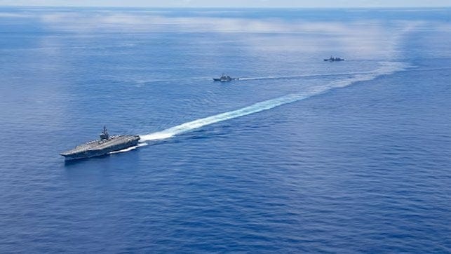 USS George Washington Carrier Strike Group sails in formation with Japan Maritime Self- Defense Force 