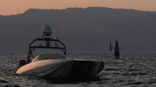 A T-38 Devil Ray (left) and a Saildrone (right) in the U.S. 5th Fleet area of responsibility (Task Force 59)