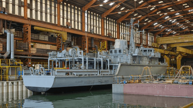 HMS Quorn in a covered shipyard shed at Appledore