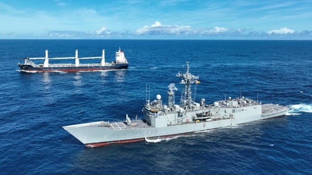 Spanish frigate and cargo ship