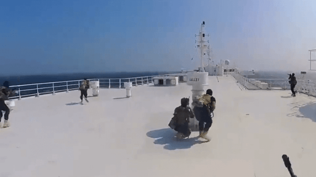Houthi commandos move forward up the top deck of the Galaxy Leader, Nov. 19 (Houthi Military Media)