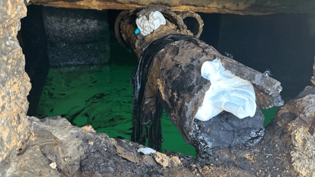 A corroded pipe was leaking oil between piers 2 and 3 (Courtesy USCG)