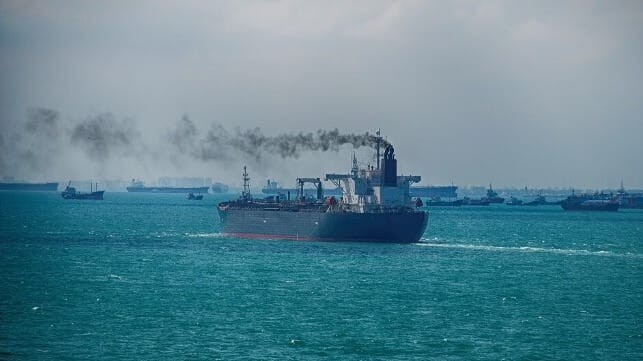 Vessel getting under way and emitting smoke