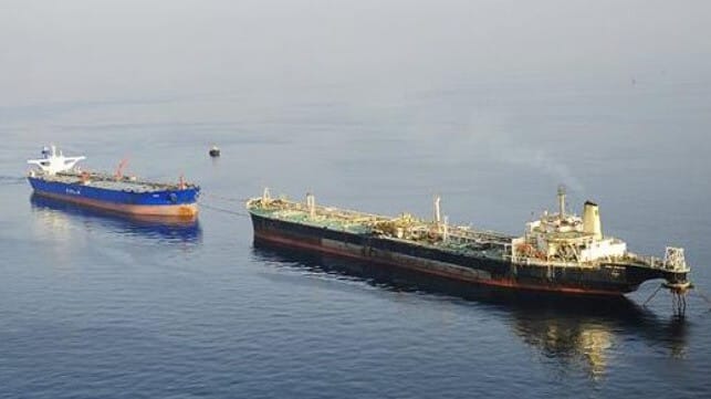 An Iranian FSU offloads oil to a waiting tanker (NITC)