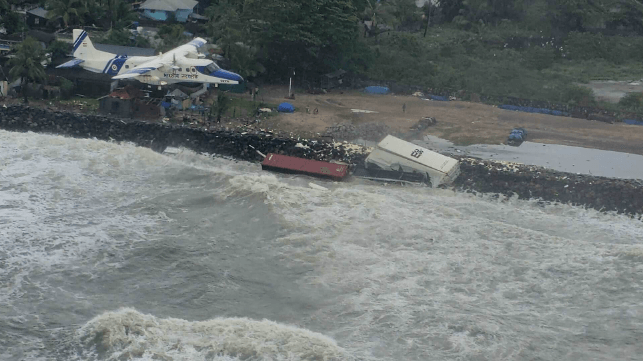 Containers from MSC Elsa 3 on a rocky shoreline in Kerala (Indian Coast Guard)