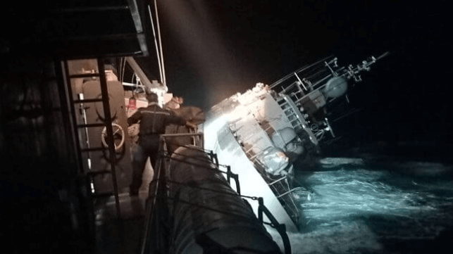Royal Thai Navy corvette listing about 70 degrees to port and sinking