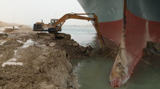Excavator digging out the bow of the Ever Given
