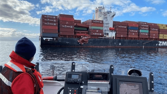 Container ship with damaged stack of containers