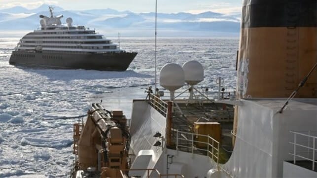 icebreaker freeing cruise ship in Antarctica