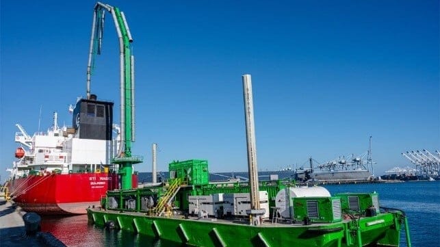 emission capture barge alongside in-service vessel