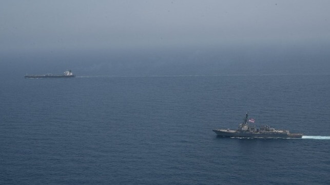 A U.S. Navy destroyer intercepts an Iranian tanker near the Strait of Hormuz (Central Command)
