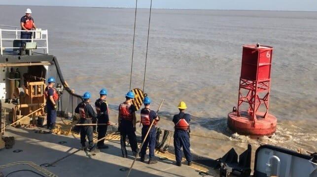 Coastguardsmen reposition a displaced buoy. The shutdown could affect ATON services, APA warned (USCG file image) 