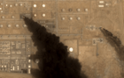 Smoke pours from a damaged storage tank after a Houthi strike on the Jizan refinery, upper left (Sentinel-2)