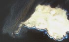 The Caroline Bezengi aground off Jazirat Al Qibliyyah on August 22, still leaking and apparently lying deeper in the water (Copernicus)