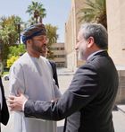 Omani foreign minister Badr Albusaidi (left) with his Iranian counterpart, Seyed Abbas Araghchi (right) (Omani Foreign Ministry)