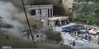 Water, mud and flying rocks engulf the Gyirong border post (Chinese social media)