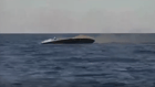 The damaged Russian drone boat lists to port and begins to sink by the stern (Ukrainian Navy)